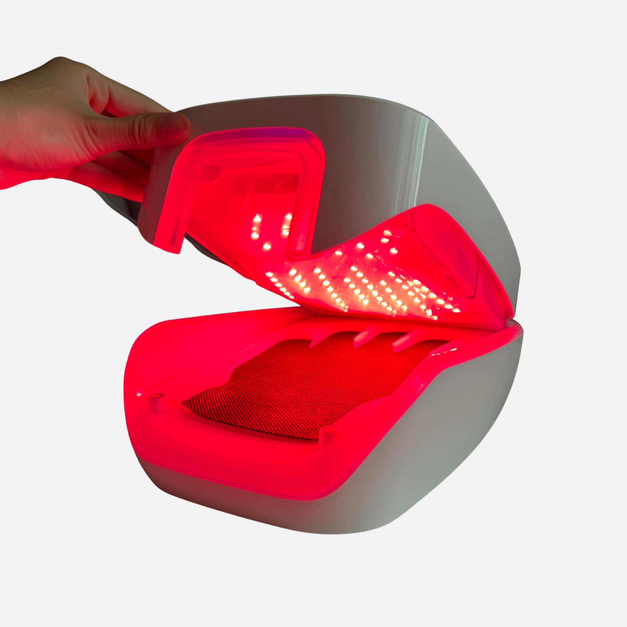 Healtlight near infrared therapy device for hands, softening rough and dry skin, providing salon-quality care at home.